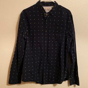 Men’s dress shirt an original by Penguin. Like new. Navy blue with yellow stars